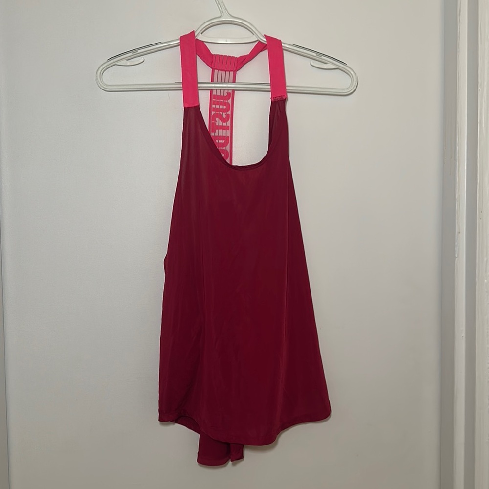 Pink Nike athletic tank top with racer back
